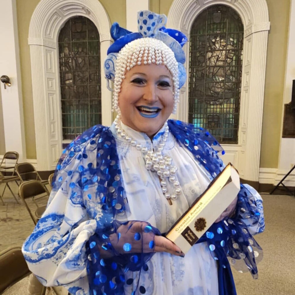 Tyffanie Morgan with Creator Award in hand 2024