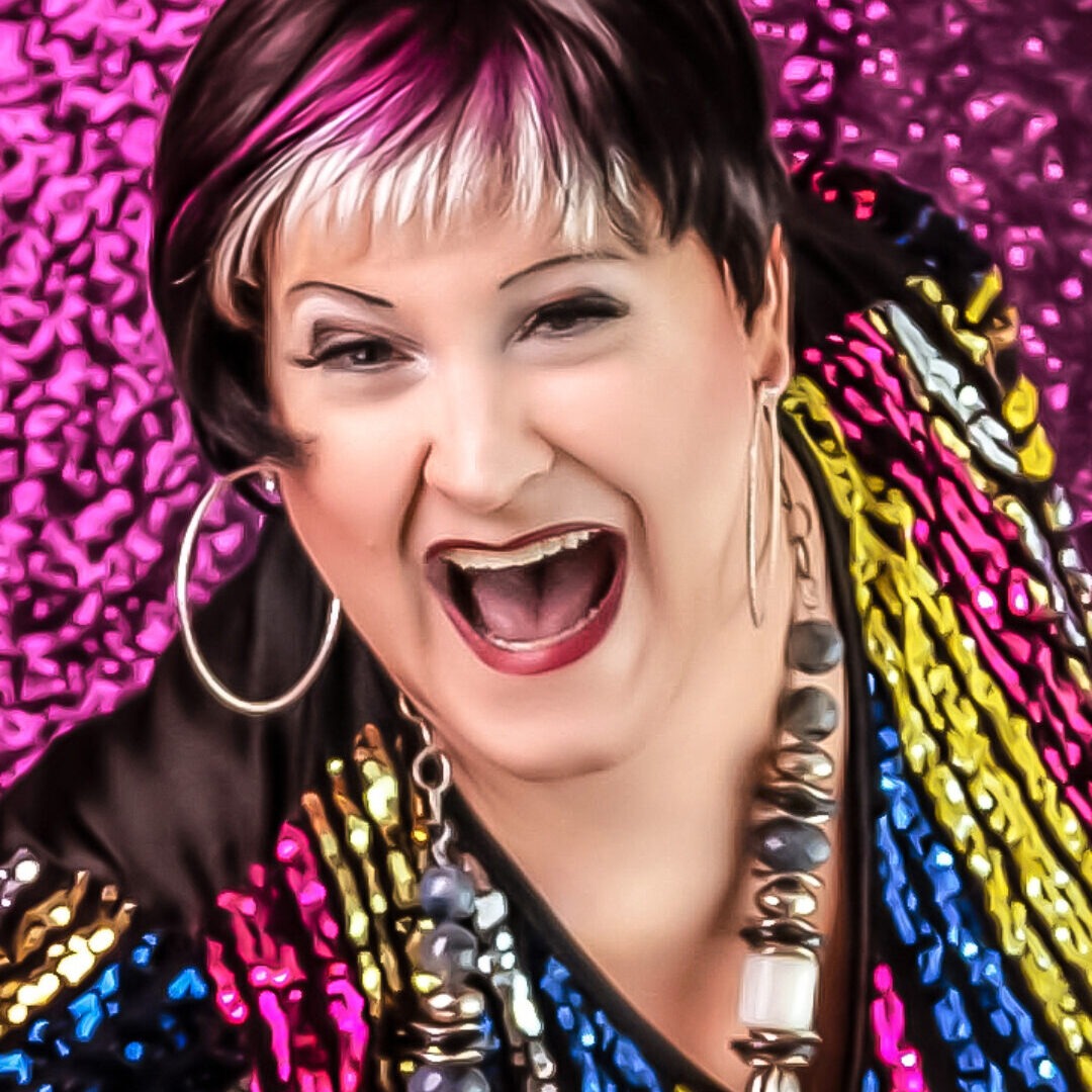 Tyffanie in sequins in front of sequins - By Becky Hinch Photography