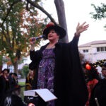 Tyffanie casting a spell at the Kingston Witches Walk 2026